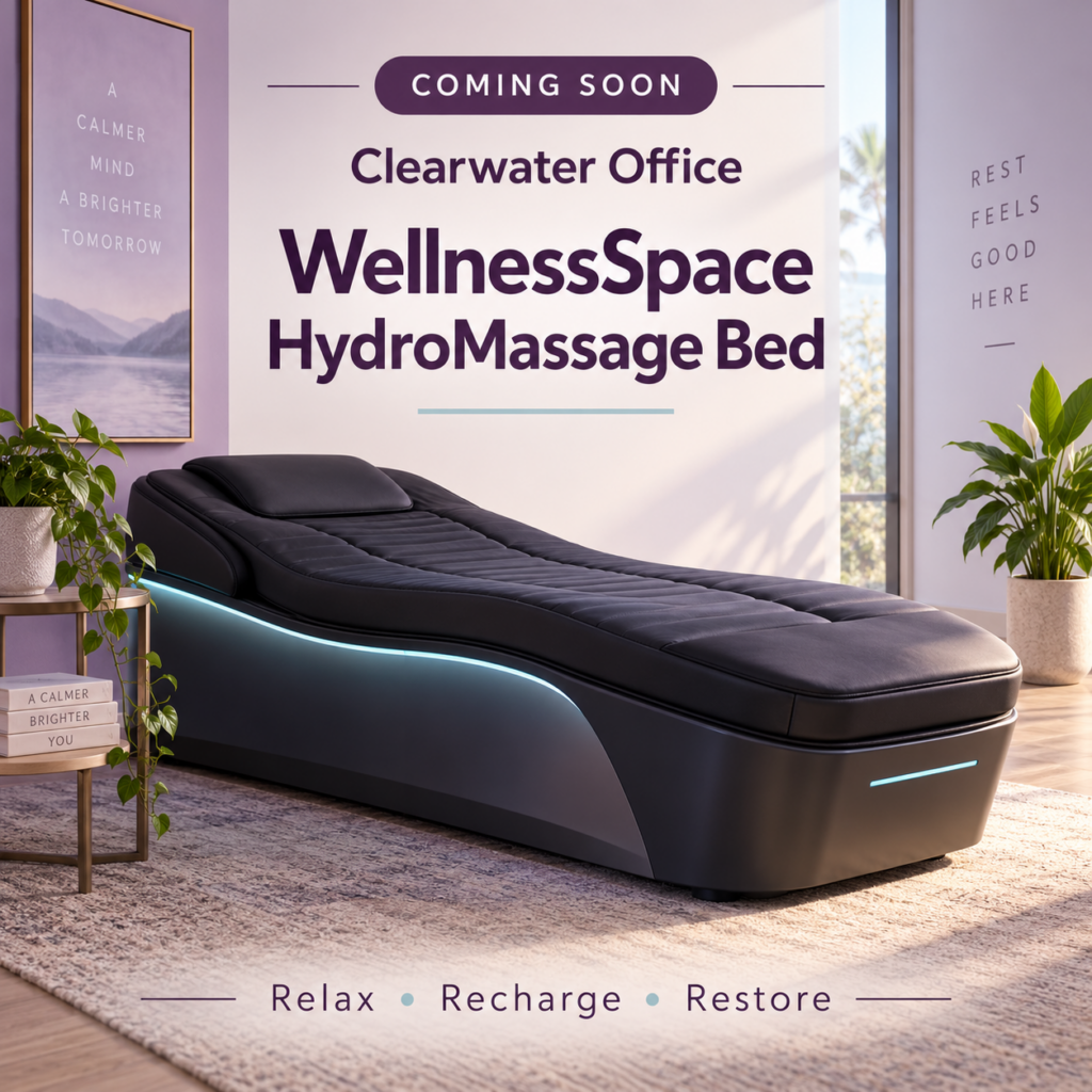 Promotional graphic for a Clearwater Office WellnessSpace HydroMassage Bed, featuring a black massage bed with blue accent lighting, the text “Coming Soon,” and the words “Relax, Recharge, Restore” at the bottom.